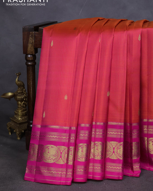Pure kanchipuram silk saree dual shade of pinkish orange and pink with allover zari weaves & buttas and annam zari woven border