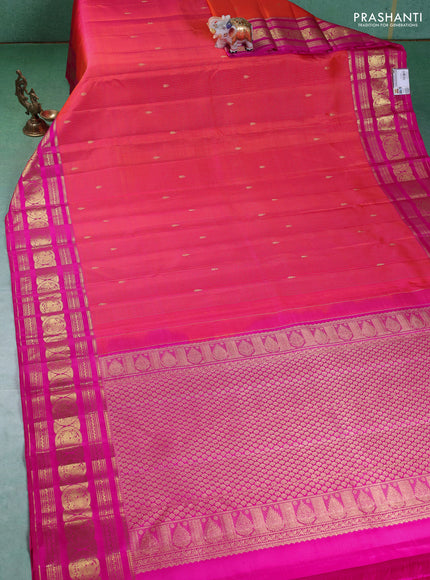 Pure kanchipuram silk saree dual shade of pinkish orange and pink with allover zari weaves & buttas and annam zari woven border