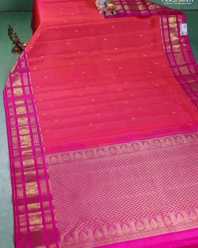 Pure kanchipuram silk saree dual shade of pinkish orange and pink with allover zari weaves & buttas and annam zari woven border