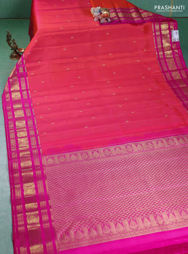 Pure kanchipuram silk saree dual shade of pinkish orange and pink with allover zari weaves & buttas and annam zari woven border