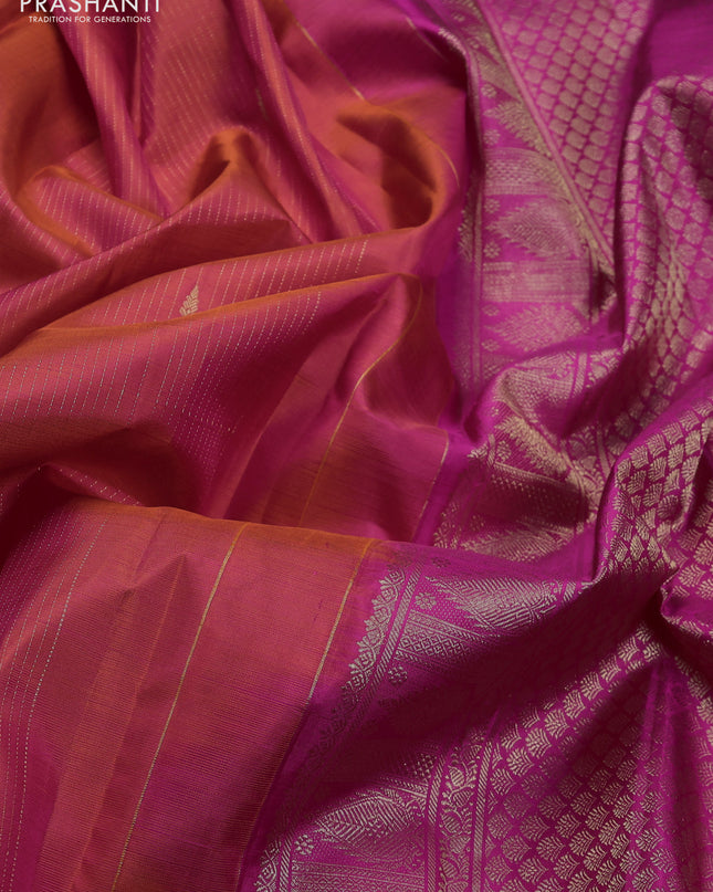 Pure kanchipuram silk saree dual shade of pinkish orange and pink with allover zari weaves & buttas and annam zari woven border