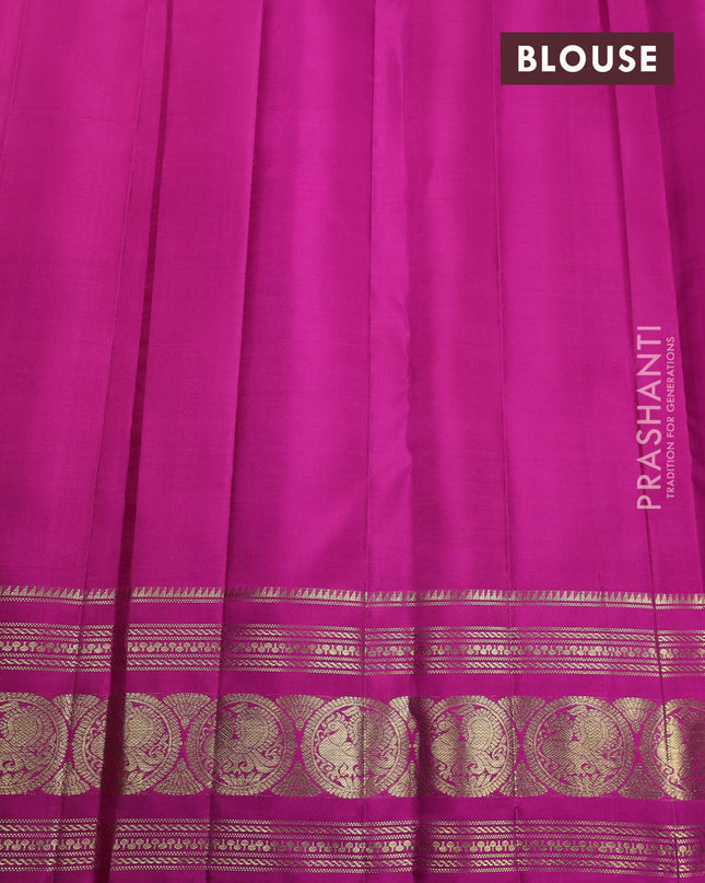 Pure kanchipuram silk saree dual shade of pinkish orange and pink with allover zari weaves & buttas and annam zari woven border