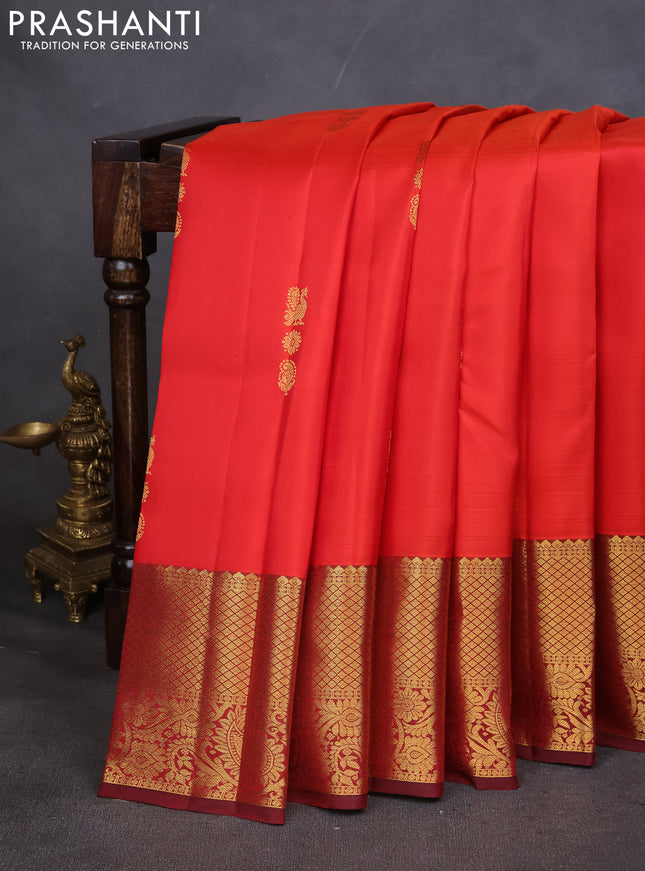 Pure kanchipuram silk saree orange and maroon with annam zari woven buttas and zari woven border