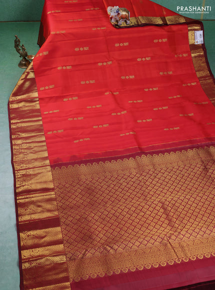 Pure kanchipuram silk saree orange and maroon with annam zari woven buttas and zari woven border