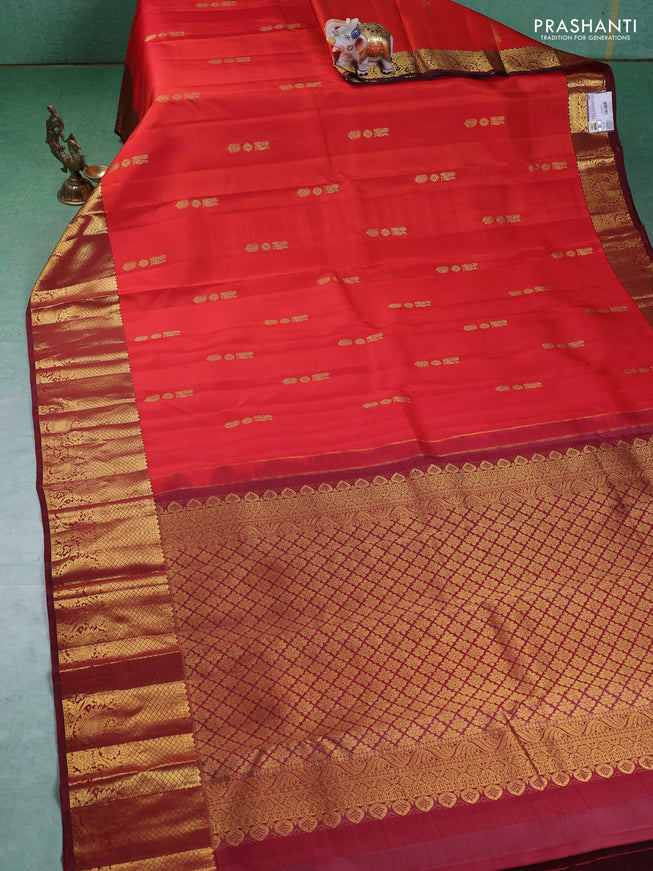 Pure kanchipuram silk saree orange and maroon with annam zari woven buttas and zari woven border