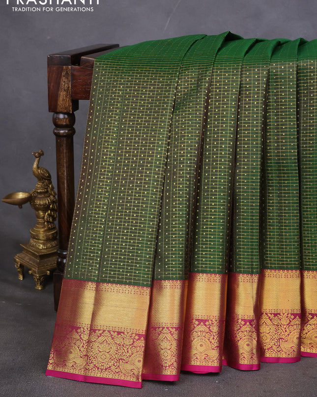Pure kanchipuram silk saree green and magenta pink with allover zari checks & lakshadeepam buttas and zari woven border