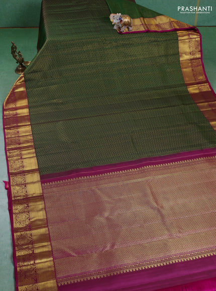Pure kanchipuram silk saree green and magenta pink with allover zari checks & lakshadeepam buttas and zari woven border