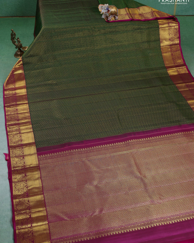 Pure kanchipuram silk saree green and magenta pink with allover zari checks & lakshadeepam buttas and zari woven border