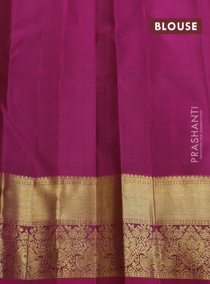 Pure kanchipuram silk saree green and magenta pink with allover zari checks & lakshadeepam buttas and zari woven border