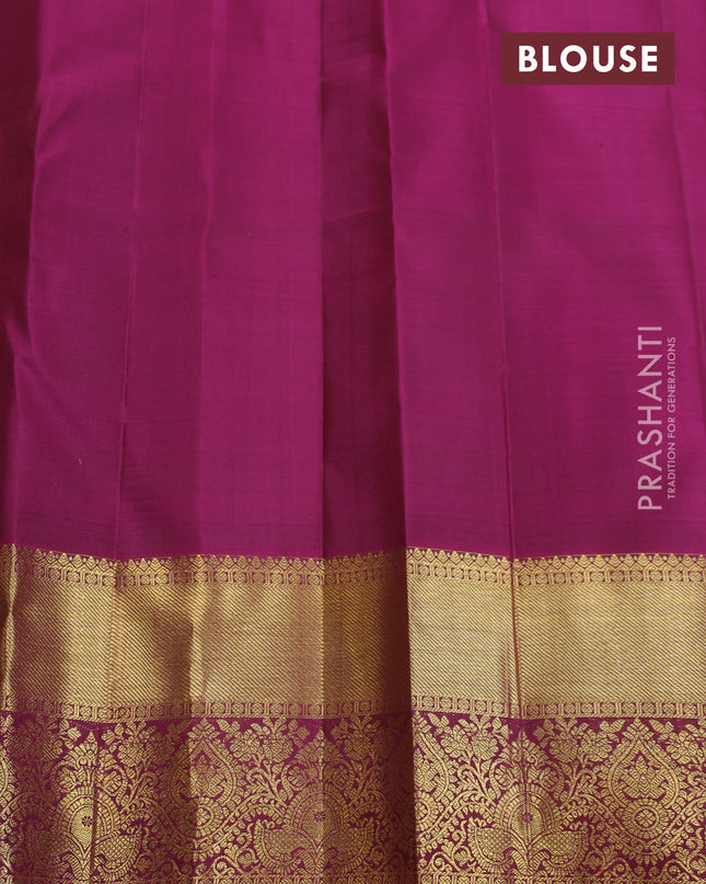 Pure kanchipuram silk saree green and magenta pink with allover zari checks & lakshadeepam buttas and zari woven border