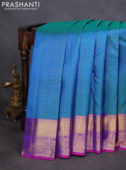 Pure kanchipuram silk saree dual shade of teal blue and orange with allover zari checks & lakshadeepam buttas and zari woven border