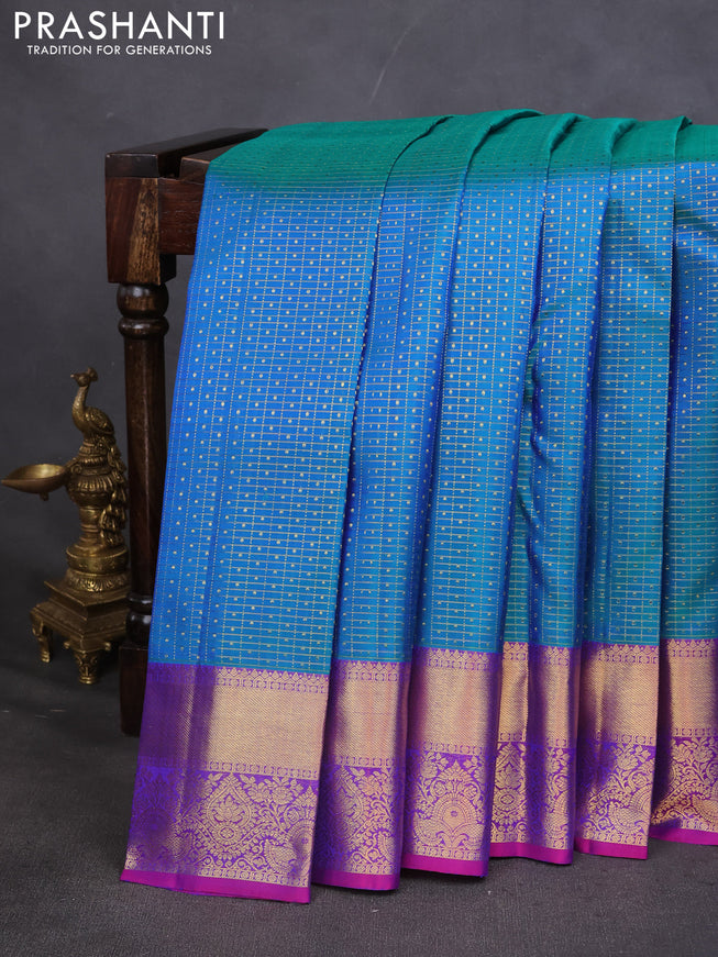 Pure kanchipuram silk saree dual shade of teal blue and orange with allover zari checks & lakshadeepam buttas and zari woven border