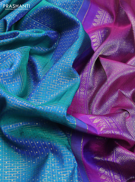 Pure kanchipuram silk saree dual shade of teal blue and orange with allover zari checks & lakshadeepam buttas and zari woven border