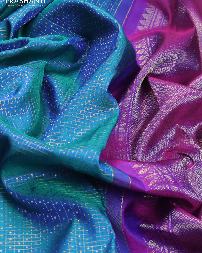 Pure kanchipuram silk saree dual shade of teal blue and orange with allover zari checks & lakshadeepam buttas and zari woven border