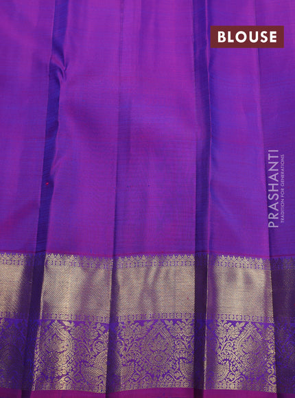 Pure kanchipuram silk saree dual shade of teal blue and orange with allover zari checks & lakshadeepam buttas and zari woven border
