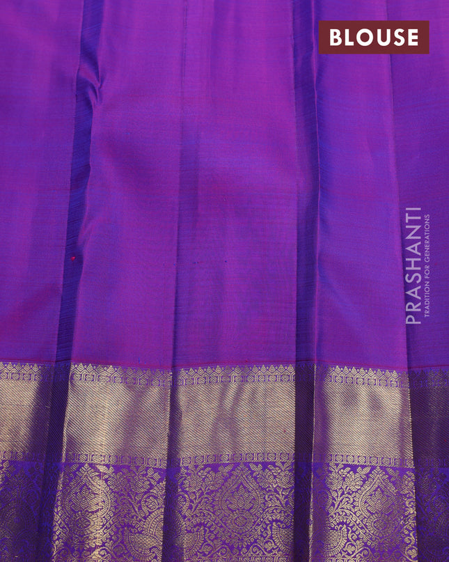 Pure kanchipuram silk saree dual shade of teal blue and orange with allover zari checks & lakshadeepam buttas and zari woven border