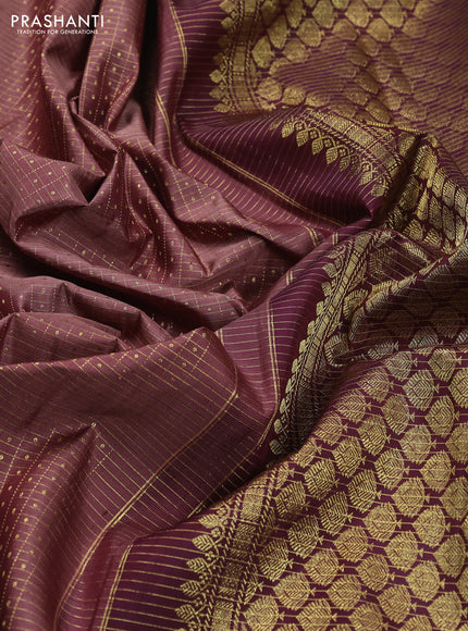 Pure kanchipuram silk saree brown and deep wine with allover zari checks & lakshadeepam buttas and zari woven border