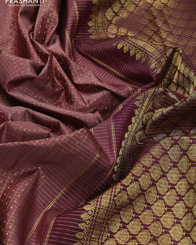 Pure kanchipuram silk saree brown and deep wine with allover zari checks & lakshadeepam buttas and zari woven border