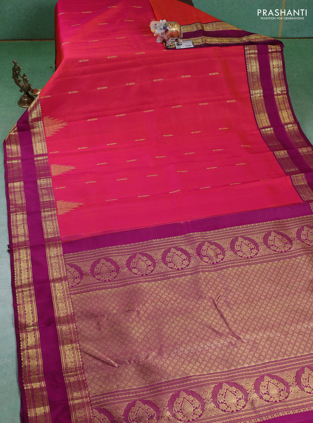 Pure kanchipuram silk saree dual shade of pinkish orange and purple with zari woven buttas and rettapet zari woven border