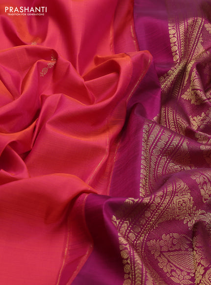 Pure kanchipuram silk saree dual shade of pinkish orange and purple with zari woven buttas and rettapet zari woven border