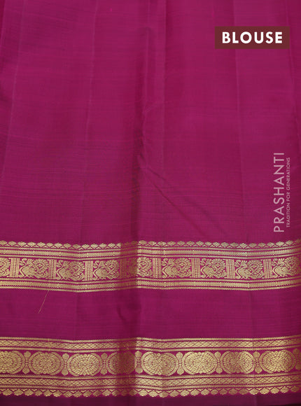 Pure kanchipuram silk saree dual shade of pinkish orange and purple with zari woven buttas and rettapet zari woven border
