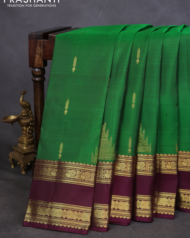 Pure kanchipuram silk saree green and deep wine with zari woven buttas and rettapet zari woven border