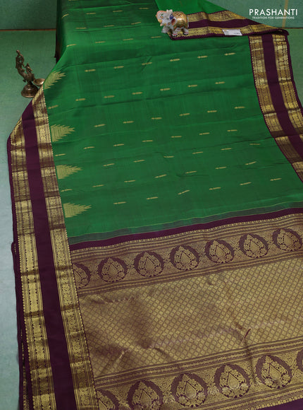 Pure kanchipuram silk saree green and deep wine with zari woven buttas and rettapet zari woven border