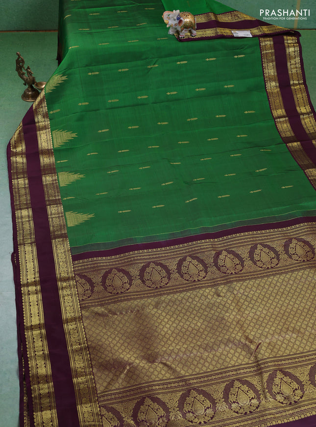 Pure kanchipuram silk saree green and deep wine with zari woven buttas and rettapet zari woven border