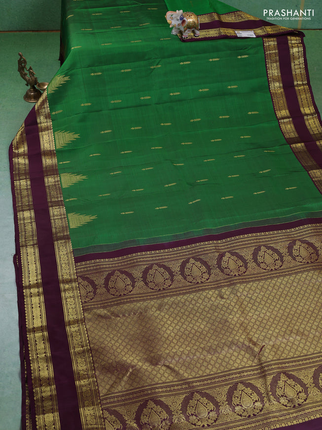 Pure kanchipuram silk saree green and deep wine with zari woven buttas and rettapet zari woven border