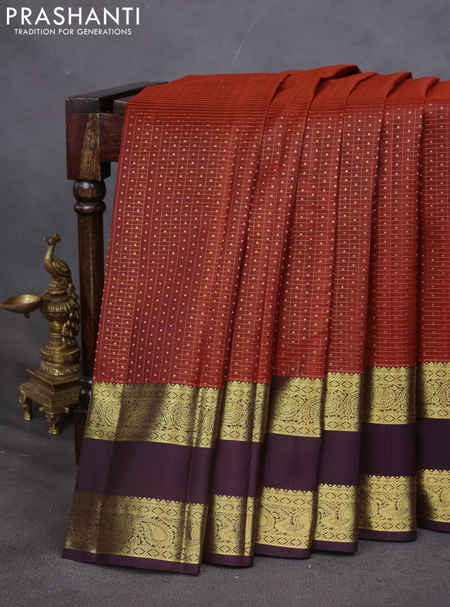 Pure kanchipuram silk saree rustic orange and deep wine with allover zari checks & lakshadeepam buttas and rettapet zari woven border