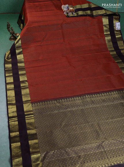 Pure kanchipuram silk saree rustic orange and deep wine with allover zari checks & lakshadeepam buttas and rettapet zari woven border