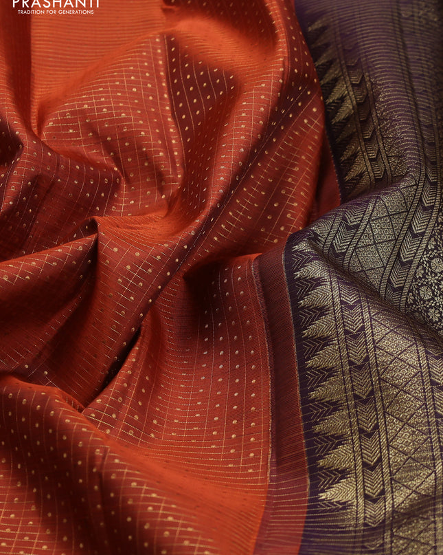 Pure kanchipuram silk saree rustic orange and deep wine with allover zari checks & lakshadeepam buttas and rettapet zari woven border