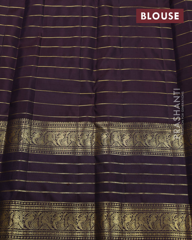 Pure kanchipuram silk saree peacock blue and deep wine with allover zari stripes pattern and long zari woven border