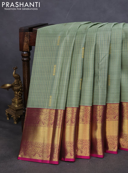 Pure kanchipuram silk saree pastel green and magenta pink with allover zari weaves and zari woven border