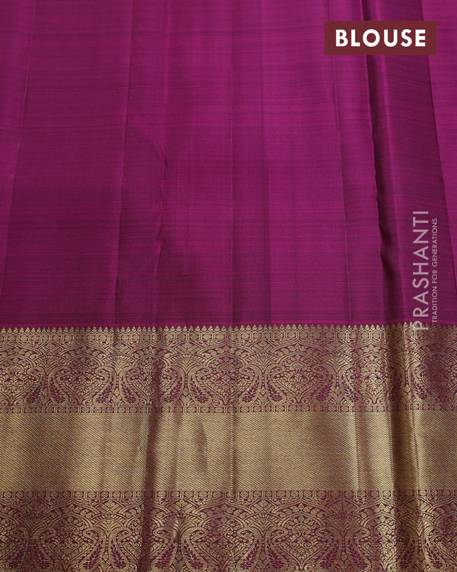 Pure kanchipuram silk saree pastel green and magenta pink with allover zari weaves and zari woven border