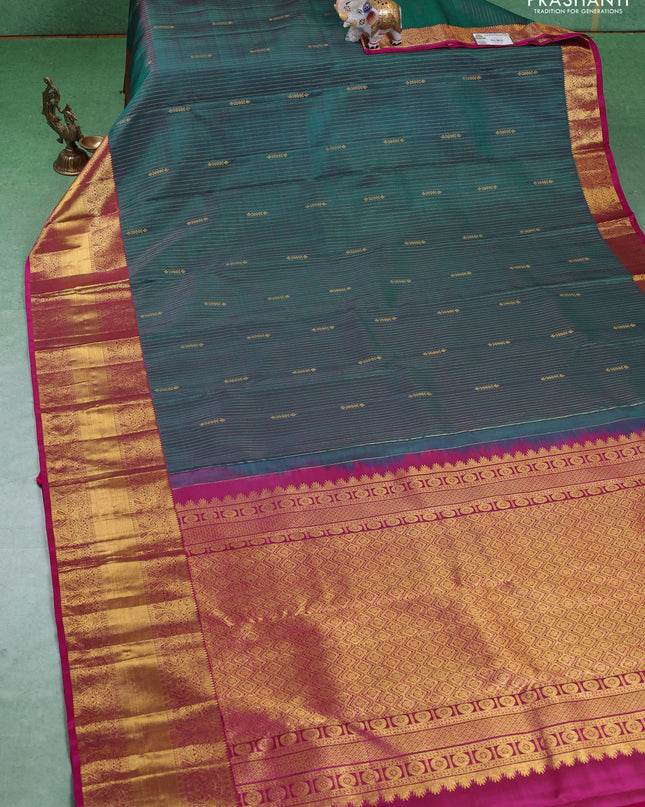 Pure kanchipuram silk saree peacock blue and pink with allover zari weaves and zari woven border
