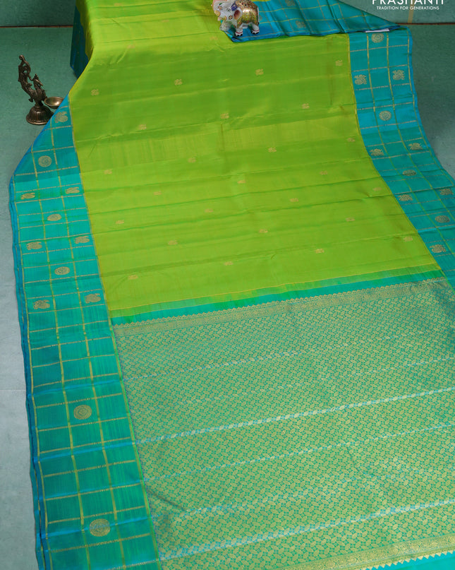 Pure kanchipuram silk saree lime green and teal blue with annam zari woven buttas and zari checked butta border