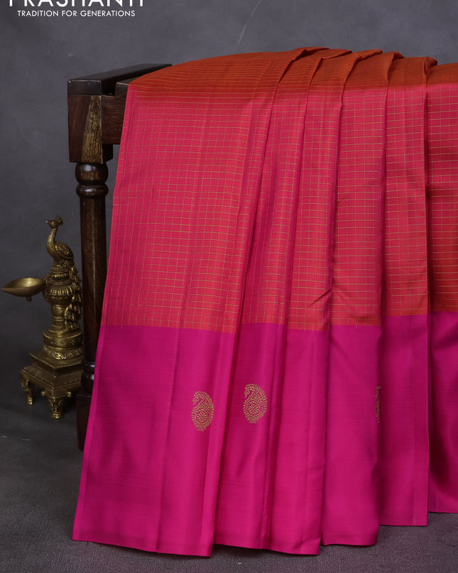Pure kanchipuram silk saree dual shade of pinkish orange and pink with allover small zari checked pattern and zari woven butta border
