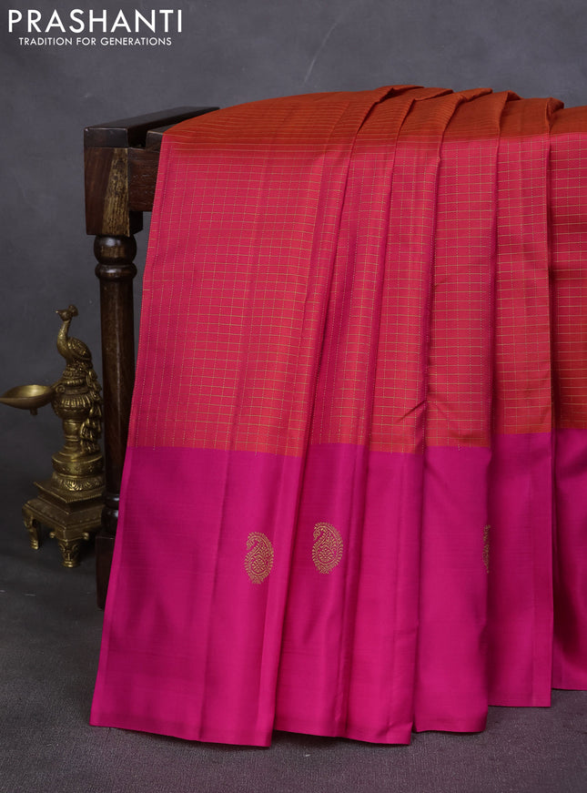Pure kanchipuram silk saree dual shade of pinkish orange and pink with allover small zari checked pattern and zari woven butta border