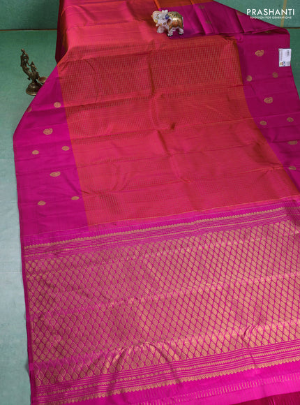 Pure kanchipuram silk saree dual shade of pinkish orange and pink with allover small zari checked pattern and zari woven butta border