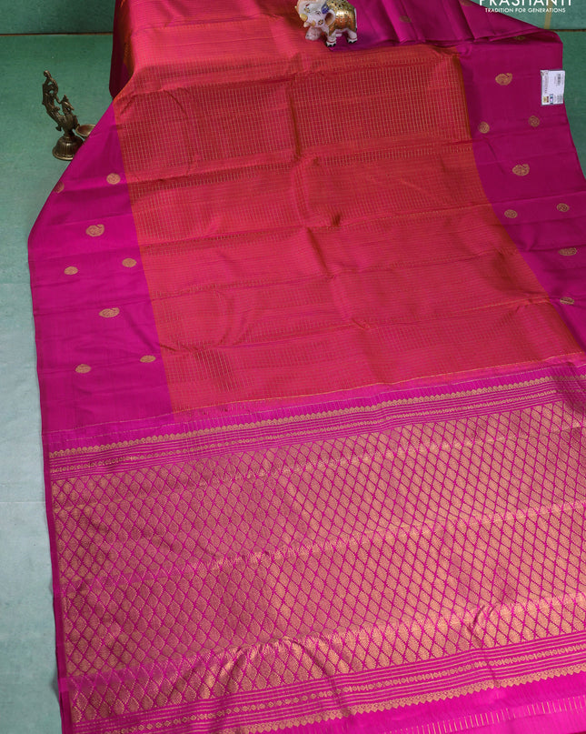 Pure kanchipuram silk saree dual shade of pinkish orange and pink with allover small zari checked pattern and zari woven butta border