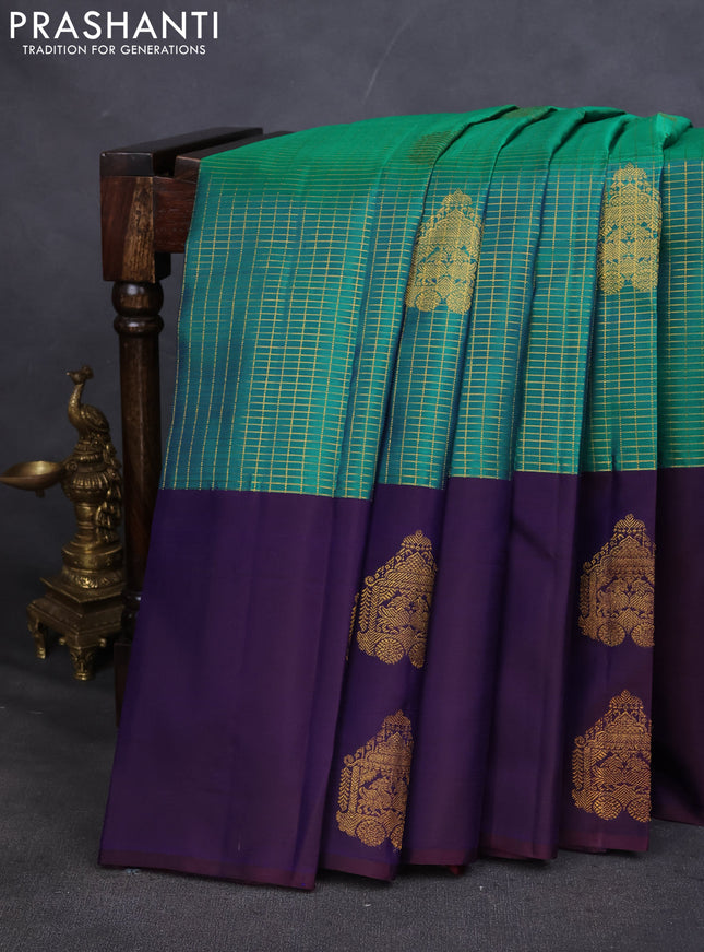 Pure kanchipuram silk saree teal green and navy blue with allover small zari checked pattern and zari woven butta border