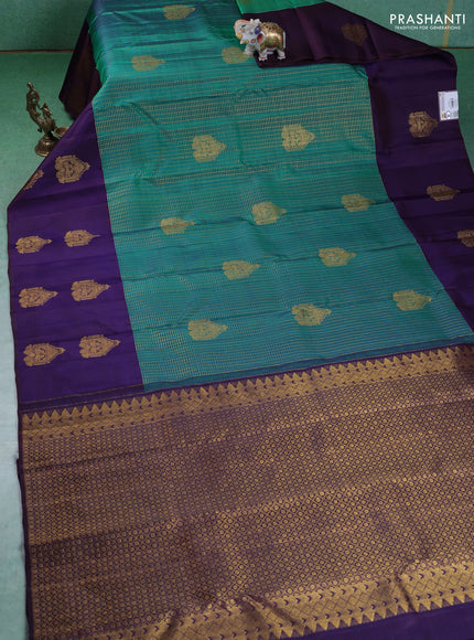 Pure kanchipuram silk saree teal green and navy blue with allover small zari checked pattern and zari woven butta border