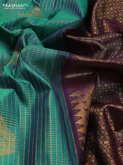 Pure kanchipuram silk saree teal green and navy blue with allover small zari checked pattern and zari woven butta border
