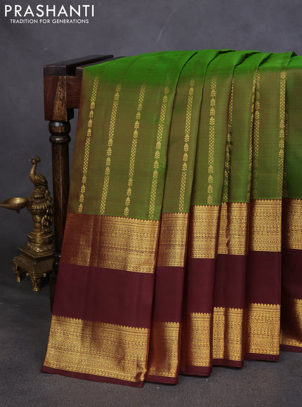 Pure kanchipuram silk saree green and deep maroon with allover zari weaves and rettapet zari woven border
