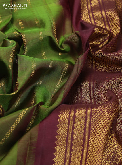 Pure kanchipuram silk saree green and deep maroon with allover zari weaves and rettapet zari woven border