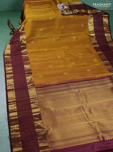 Pure kanchipuram silk saree mustard yellow and deep maroon with annam zari woven buttas and long zari woven border