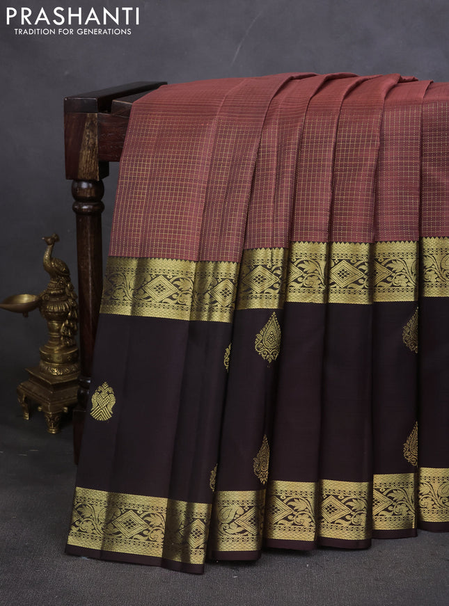 Pure kanchipuram silk saree peach shade and coffee brown with allover small zari checked pattern and long rettapet zari woven butta border