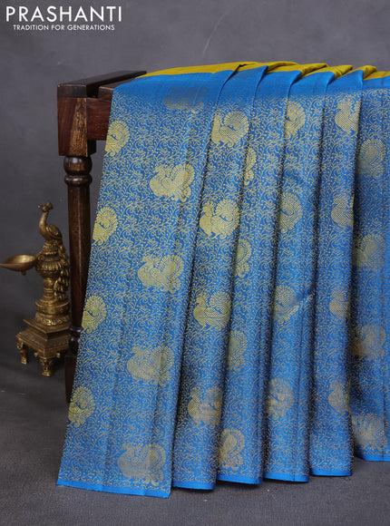 Pure kanchipuram silk saree mehendi green and cs blue with half & half style and long zari woven border