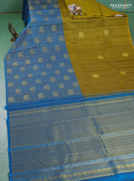 Pure kanchipuram silk saree mehendi green and cs blue with half & half style and long zari woven border